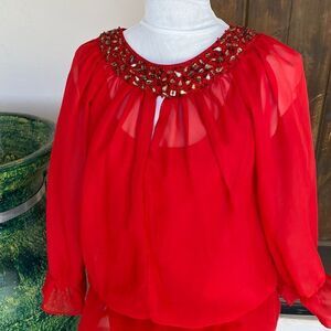 Embellished round collar sheer blouse over red tank top size large